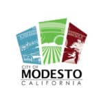 City of Modesto logo. Beneficiary of the Spirit of Giving 5K Run